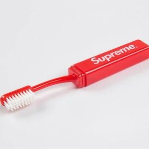 Supreme Red Travel Toothbrush